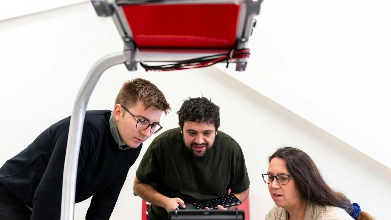 Research team reviewing the results of a prototype during an SR&ED project.